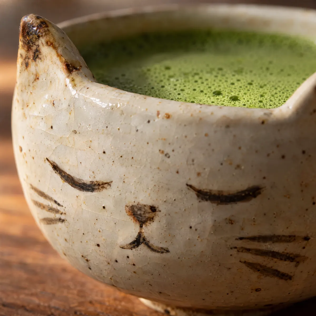 Hand-painted cat face on the bowl